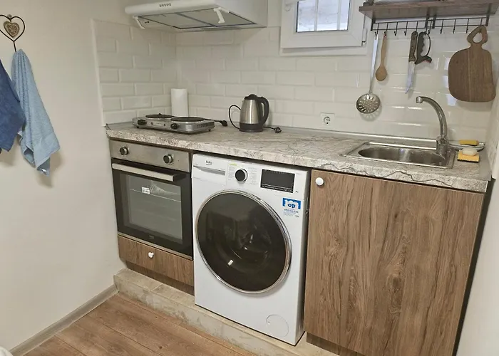 гарсониера в центъра на град L *